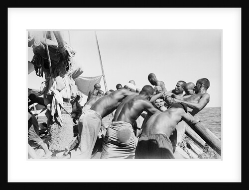 Crew rowing a pearler by Alan Villiers