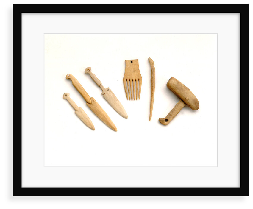 Ivory model of a snow knife, awl, comb by unknown