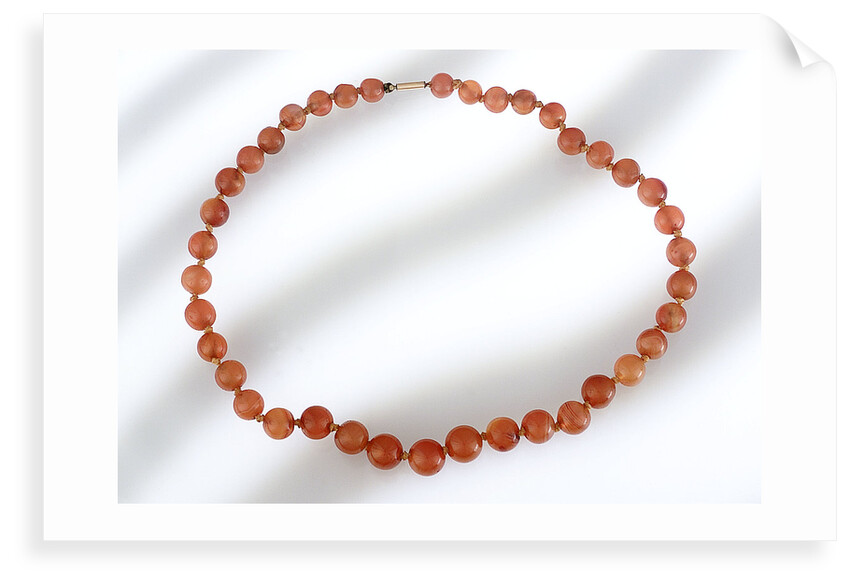 Amber beads by unknown