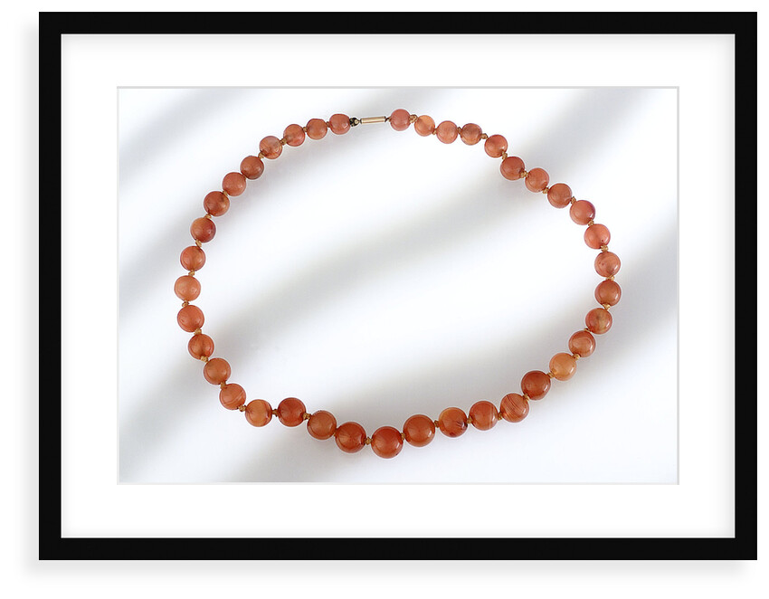 Amber beads by unknown
