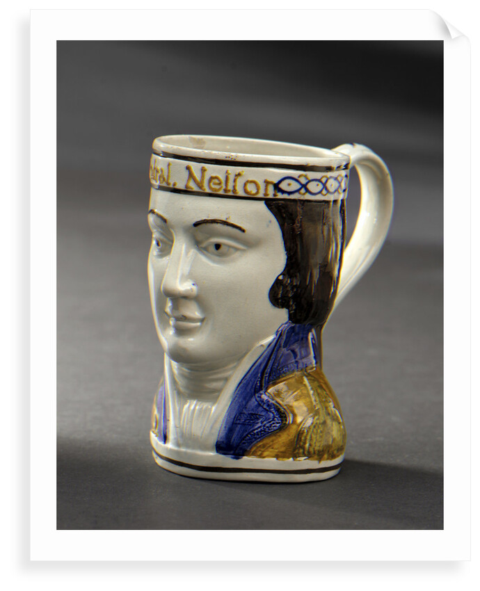 Earthenware mask mug by unknown
