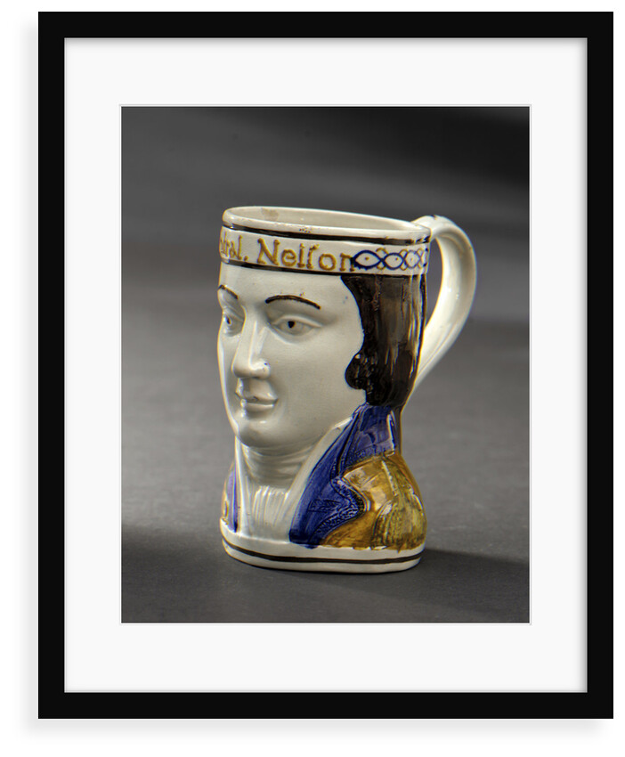 Earthenware mask mug by unknown
