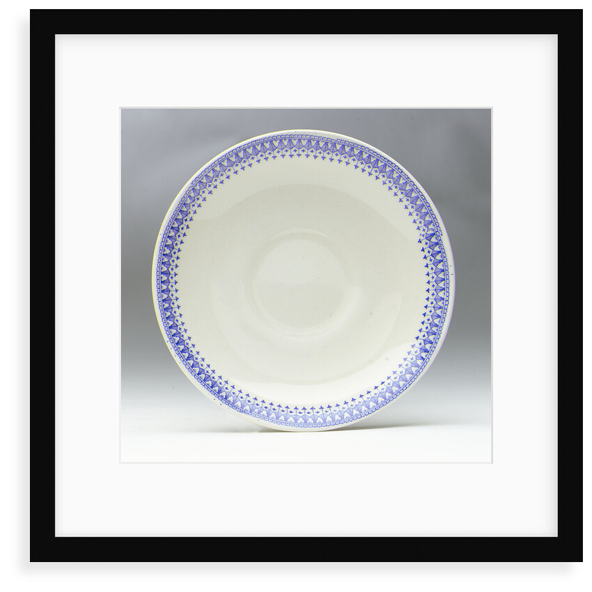 Earthenware saucer by unknown