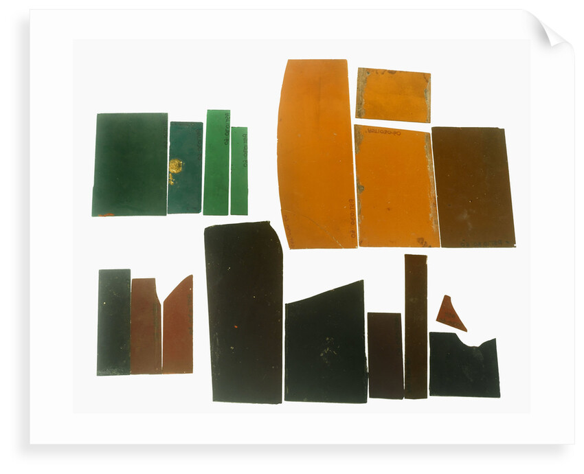 Eighteen pieces of coloured glass (five amber, three crimson, four dark green, six purple) in a bag by unknown