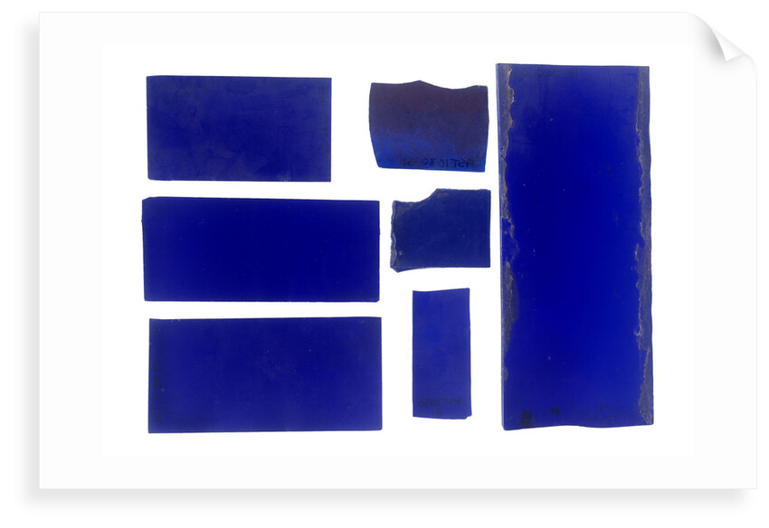 Seven pieces of cobalt blue pieces of glass in a bag by unknown