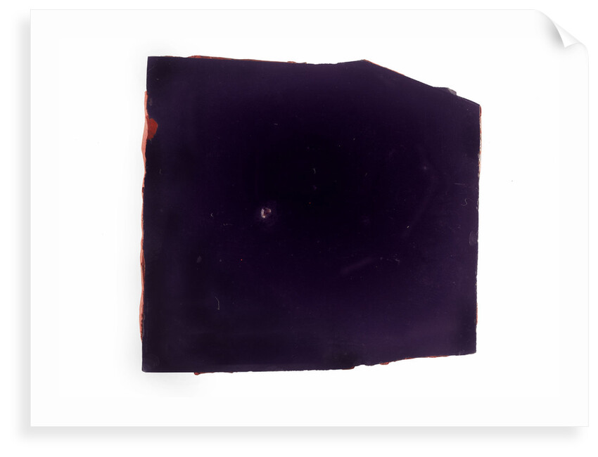 Two pieces of glass sealed together with wax in a bag by unknown
