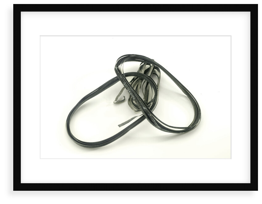 Four strips of magnesium ribbon in a bag by unknown