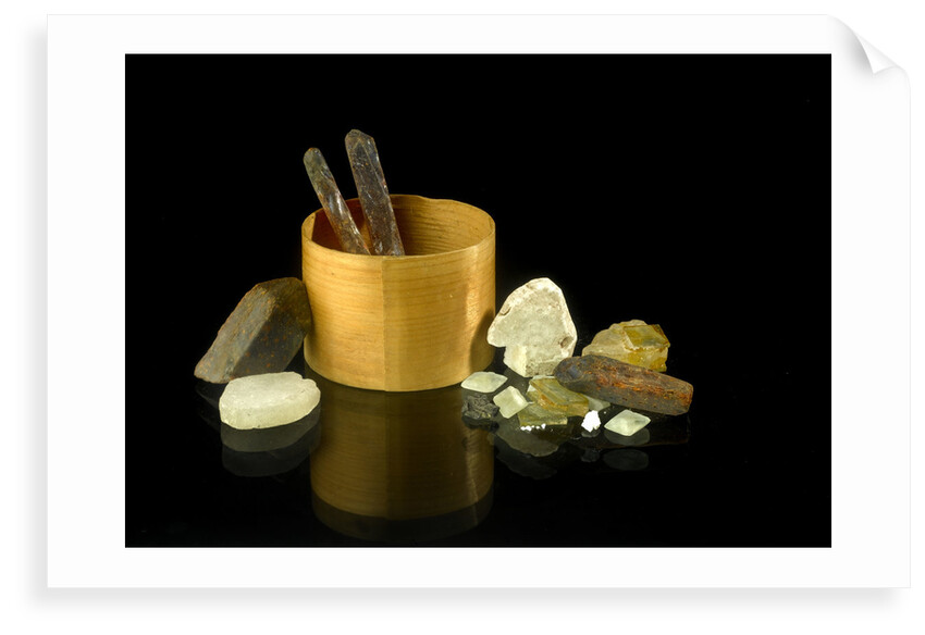Pill box without a lid containing crystals by unknown