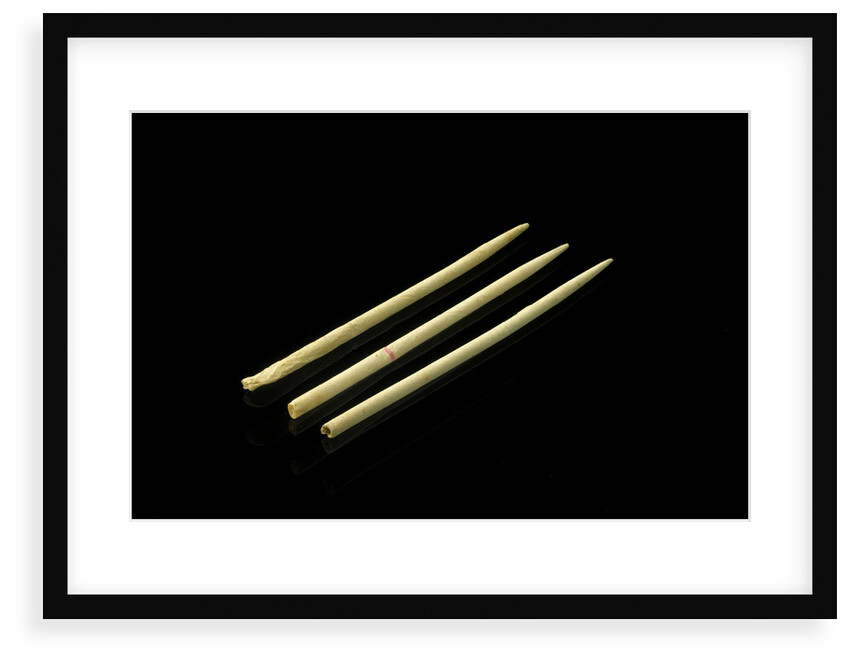 Three paper 'cocktail sticks', one still has a needle in it by unknown