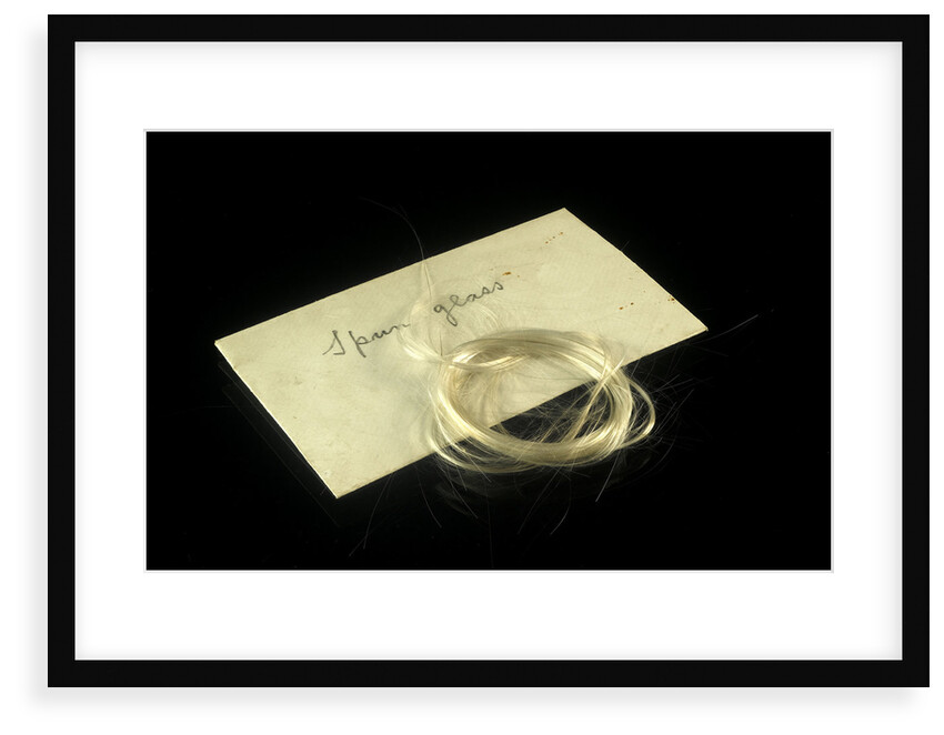 Two skeins of spun glass in an envelope by unknown