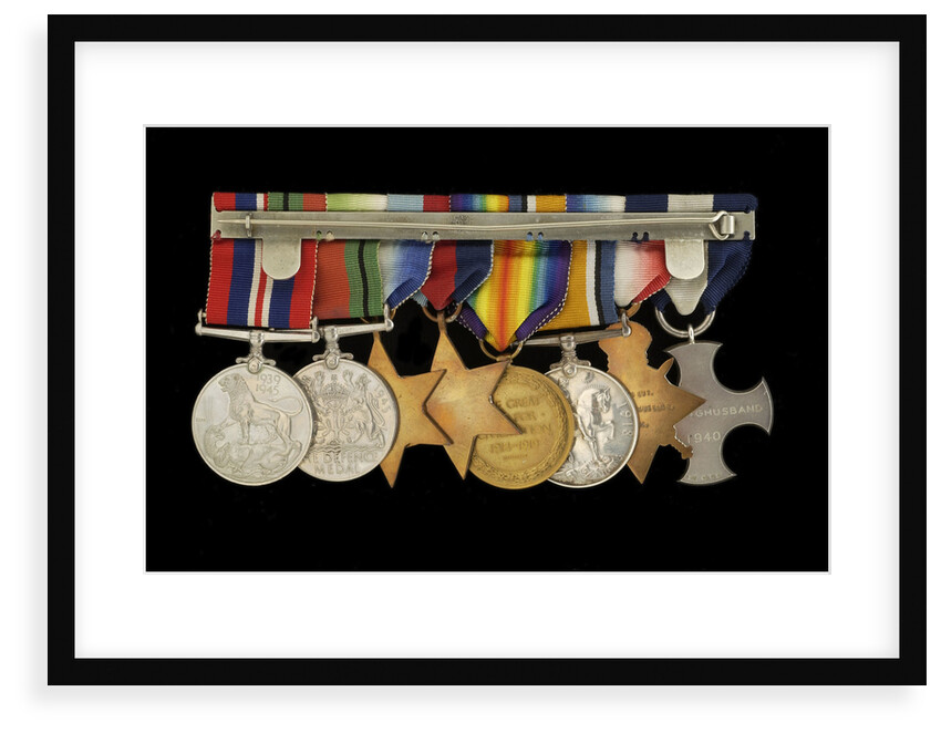 Medals awarded to Cdr J. L. Younghusband DSC (reverse, r to l, MED1228-1235) by Garrard & Co.