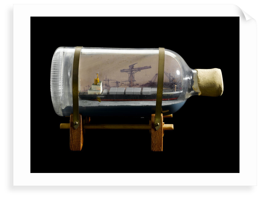 A bottle containing a model ship by unknown