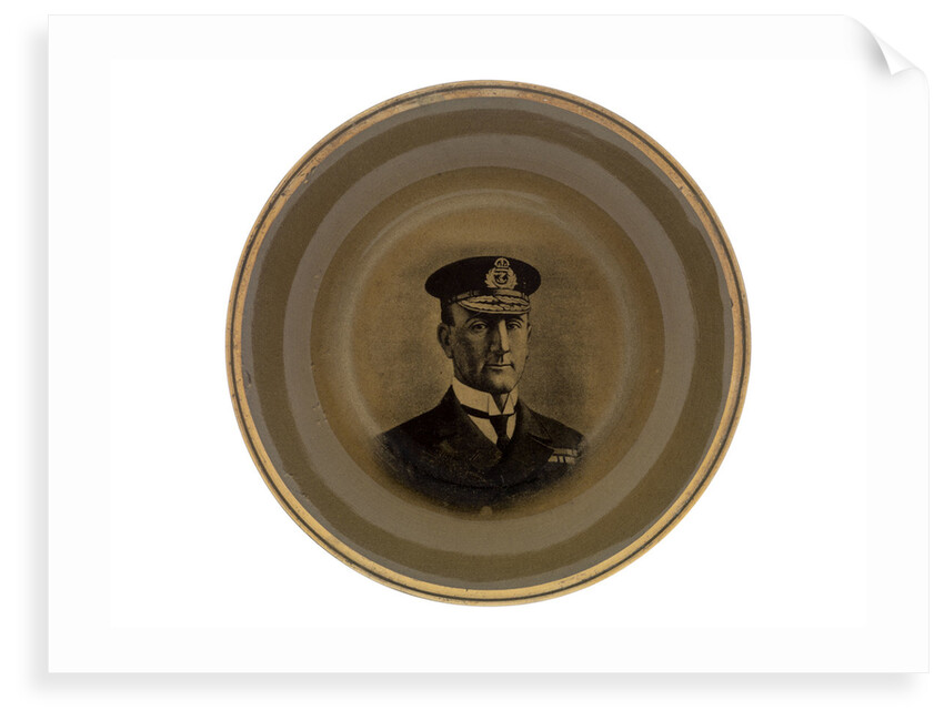 Plate glazed on a mustard ground with a gold rim by Ridgways
