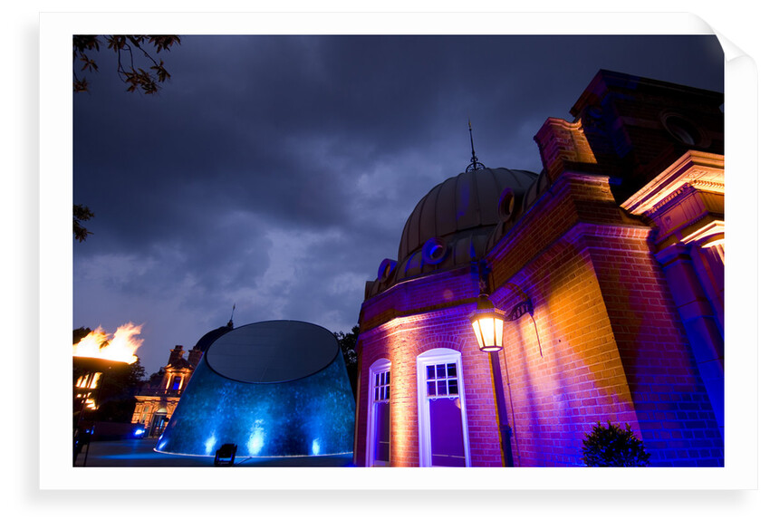 Night-time view of illuminated Royal Observatory, Greenwich, including the Peter Harrison Planetarium, Astronomy Centre (South Building) and Altazimuth Building by National Maritime Museum