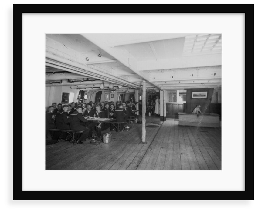 HMS 'Warspite' (1893) the boys' messdeck during meal time by unknown