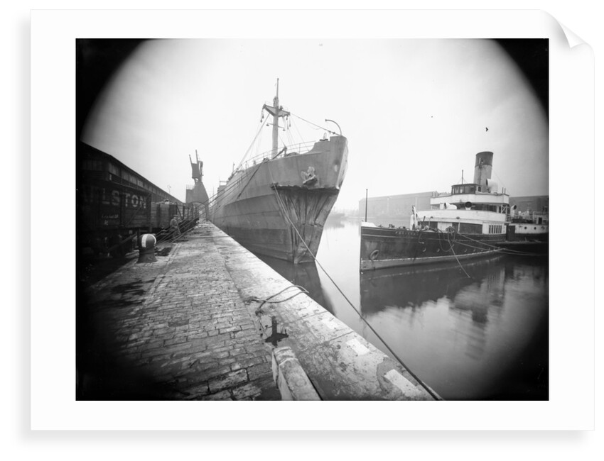 The 'Dotterel' (Br, 1936) alongside berth at Southampton with a damaged bow, slightly distant. The paddle steamer 'Portsdown' (1928) is berthed close by by unknown
