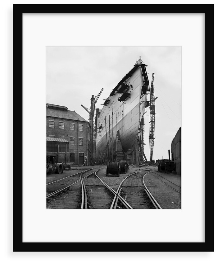 Bow view of the 'Aquitania' (1914) on the stocks by Bedford Lemere & Co.