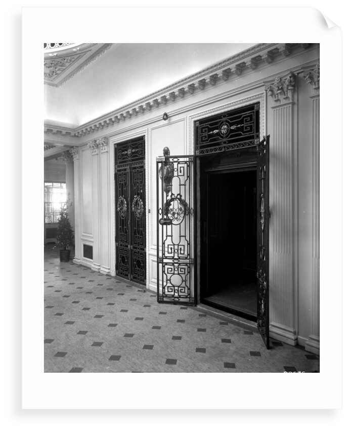 Passenger elevators in the Grand Entrance on the 'Aquitania' (1914) by Bedford Lemere & Co.