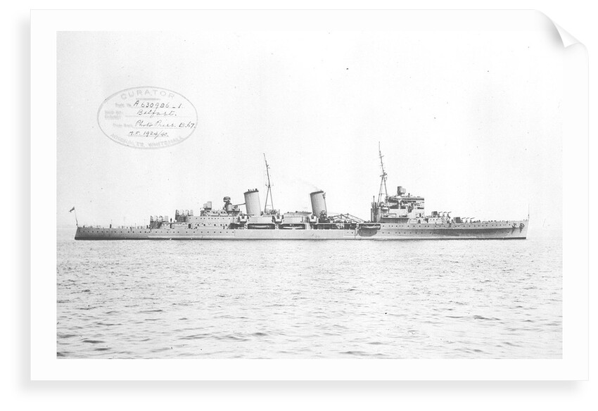 HMS 'Belfast' (1938) topped at Spithead with all guns trained to starboard by unknown