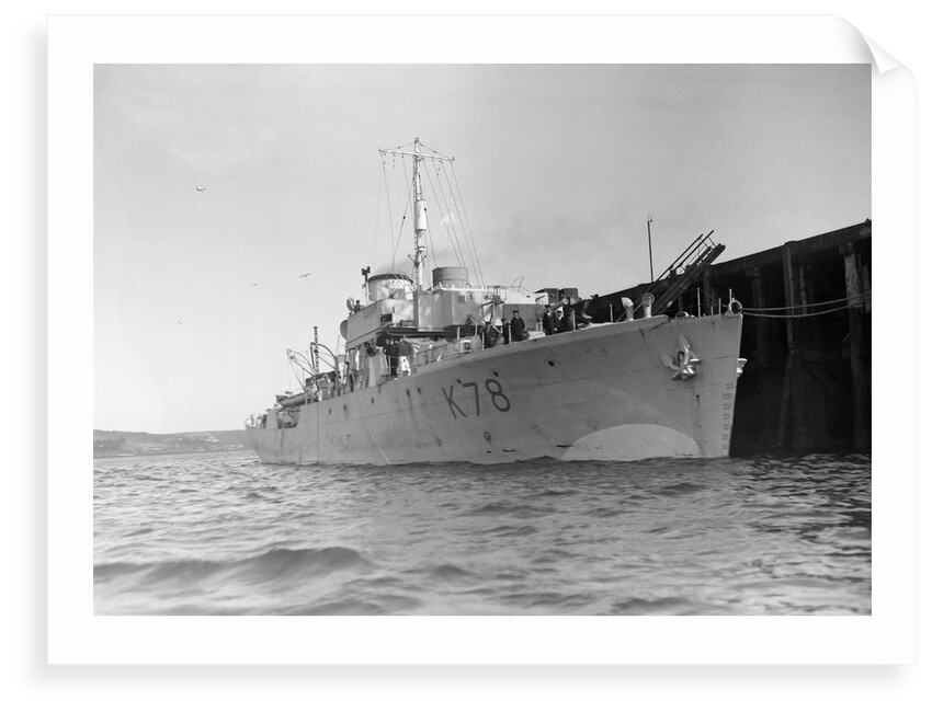 Photograph of starboard bow view of HMS 'Rhododendron' (1940) dated pre October 1942 alongside quay. Pendant K78. by unknown