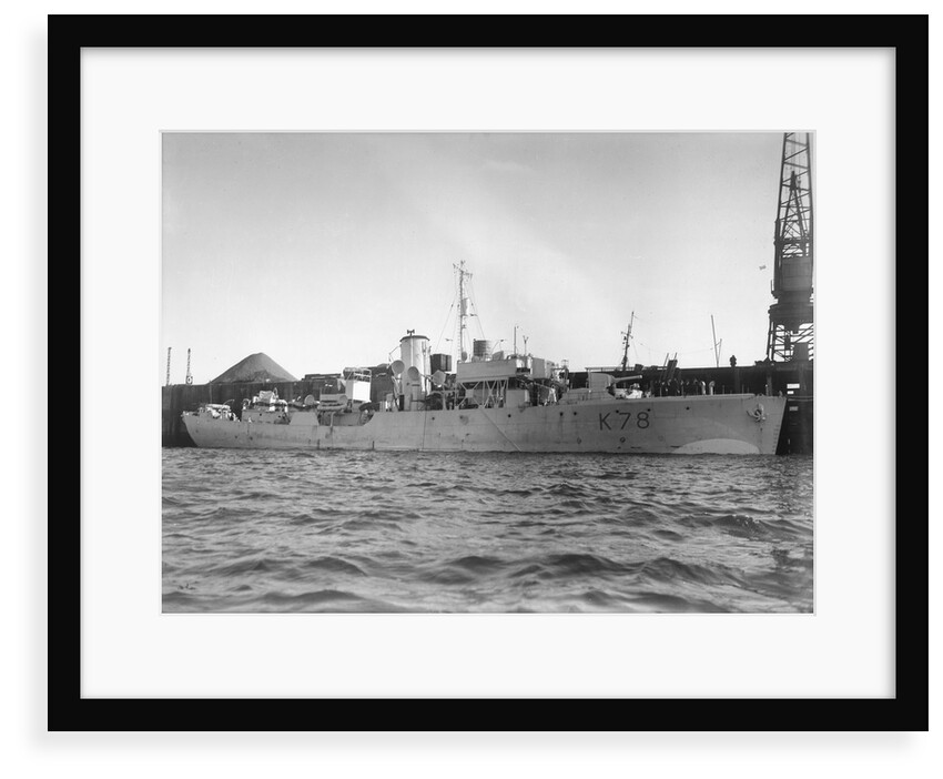 Photograph of starboard view just forward of the broadside of HMS 'Rhododendron' (1940) dated pre October 1942 alongside quay. Pendant K78. by unknown
