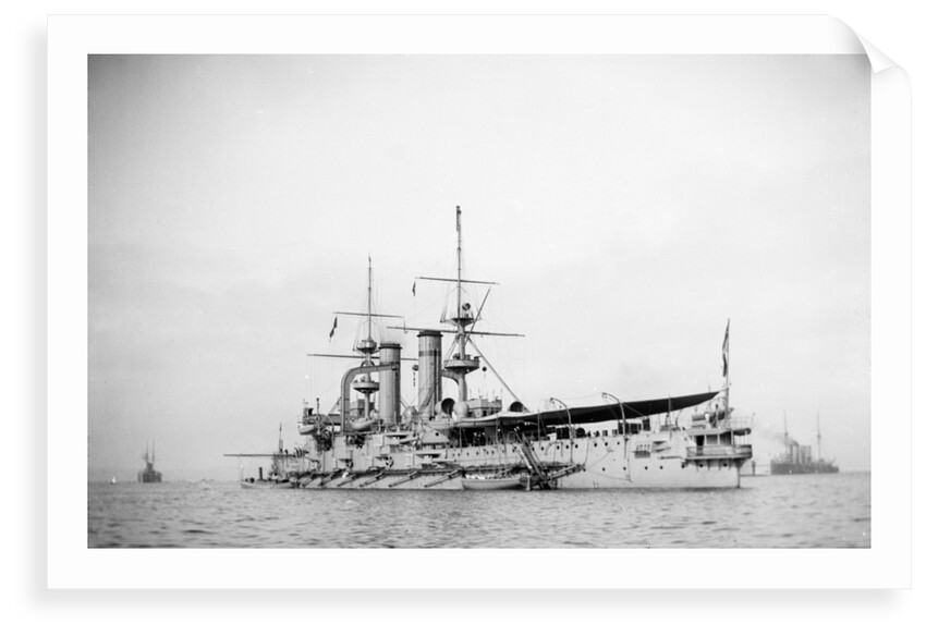 Battleship HMS 'Triumph' (1903) at anchor with awning aft by unknown