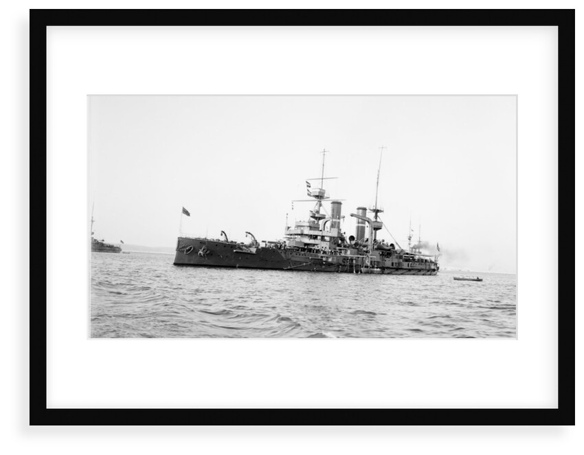 Battleship HMS 'Triumph' (1903) at anchor with awning aft by unknown