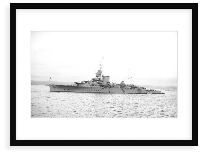 Light cruiser HMS 'Effingham' (1921) in 1939 at anchor with awning rigged aft by unknown