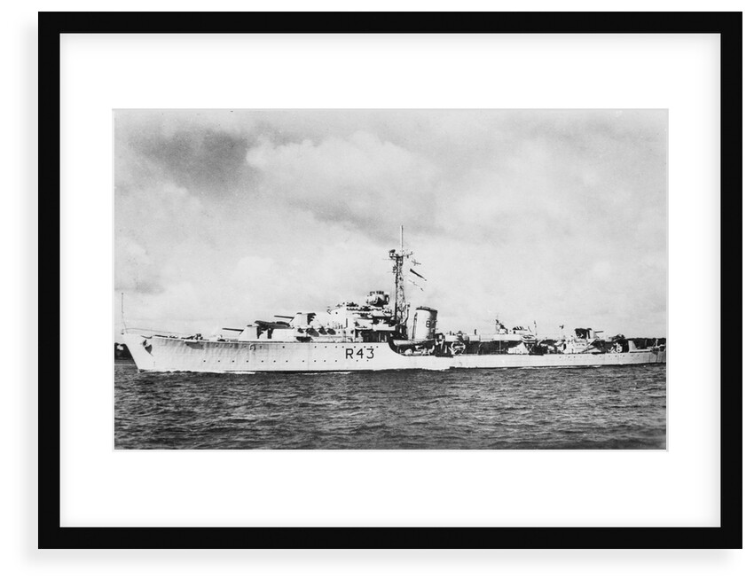 HMS 'Comus' (1945), a port near beam from just forward of broadside view, under way by unknown