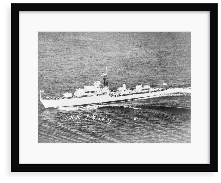 Destroyer HMS 'Daring' (1949) under way with crew in review order manning the ship by unknown