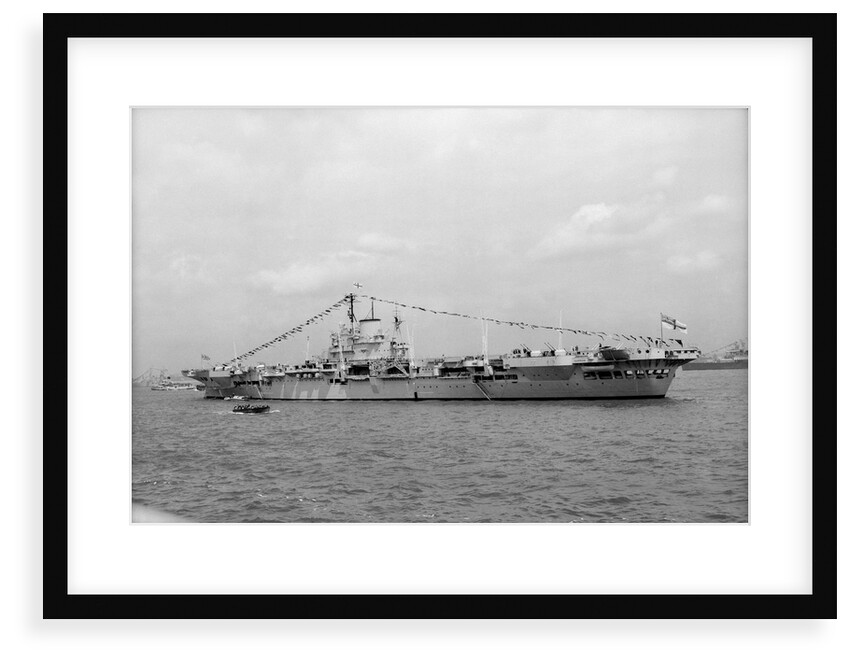 Aircraft carrier HMS 'Illustrious' (1939) on 15th June 1953, anchored in Line F at Spithead for the Coronation Review. Dressed overall by unknown