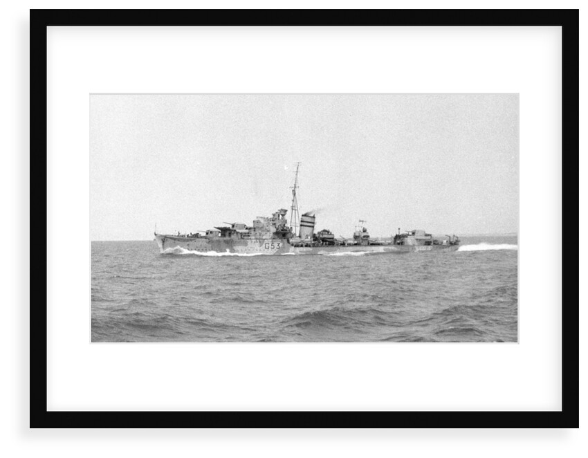 HMS 'Janus' (Br, 1938), under way at speed off Alexandria, passing HMS 'Phoebe' (Br, 1939), 12 May 1941 by unknown