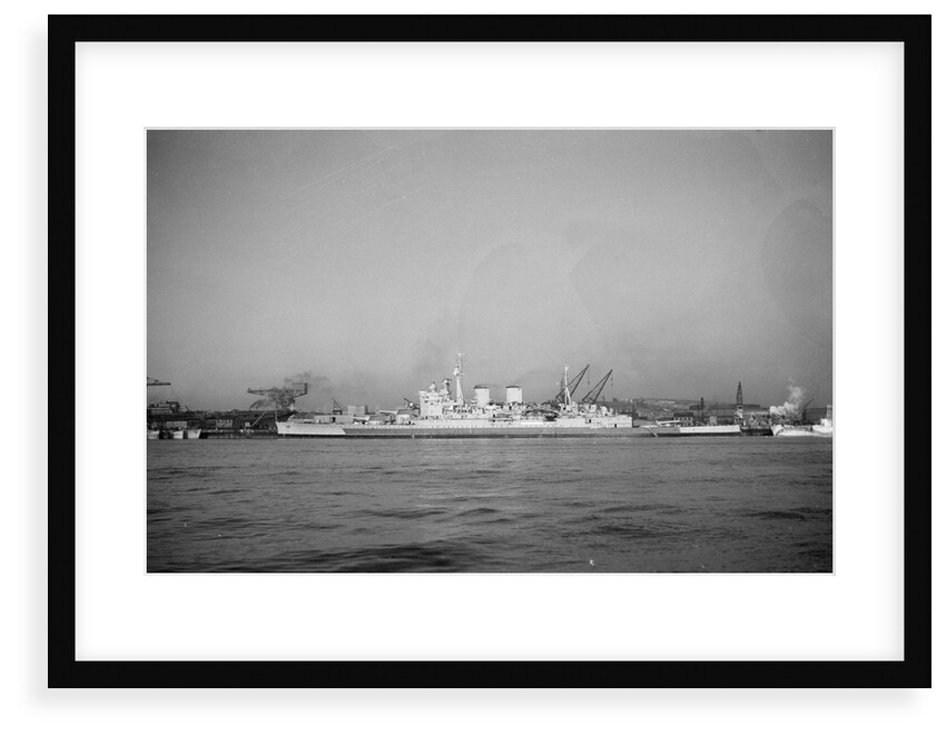 Battlecruiser HMS 'Renown' (1916) in 1945 alongside at Devonport, prior to being laid up. In the left background is the incomplete carrier 'Terrible' by unknown