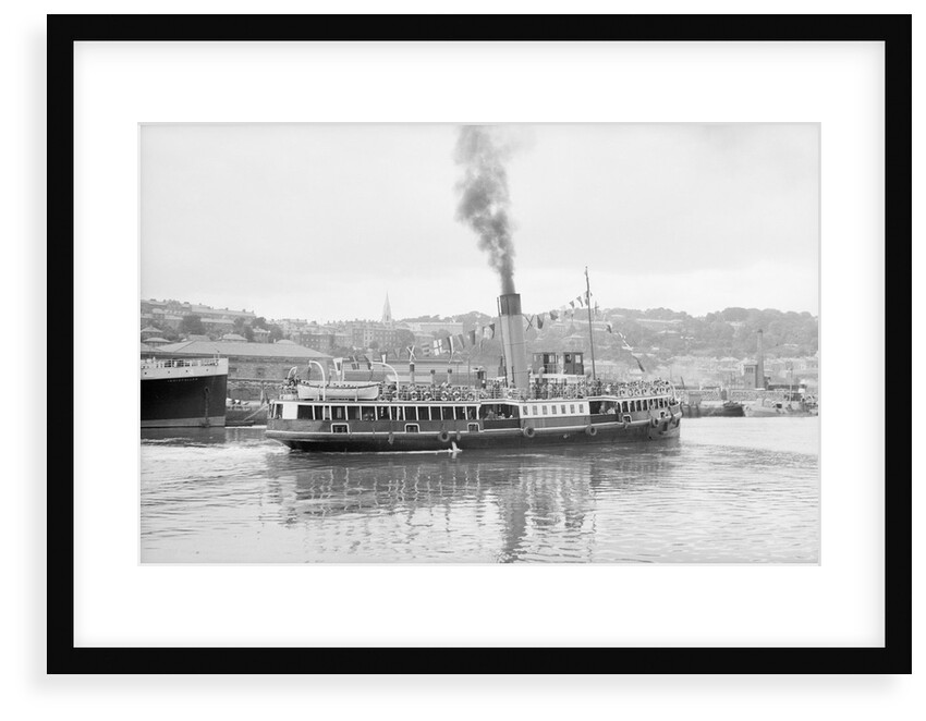 The 'Royal Iris' (Br, 1906) under way in Cork harbour, dressed overall by unknown