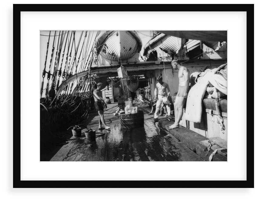 In the Doldrums after heavy rains, bathing on the well-deck by Alan Villiers