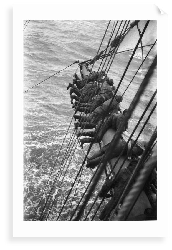 Making the main sail fast near Cape Horn, swaying on the footrope by Alan Villiers