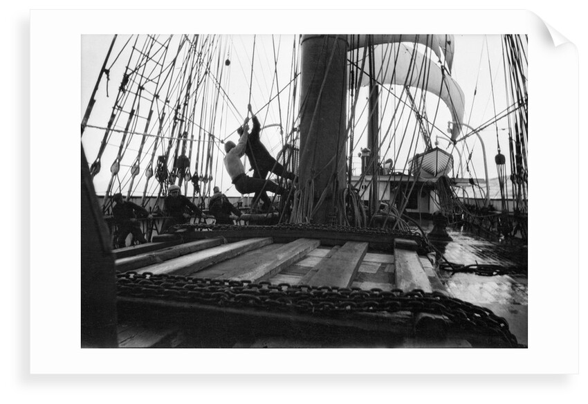 Hauling on the brace at the main mast by Alan Villiers