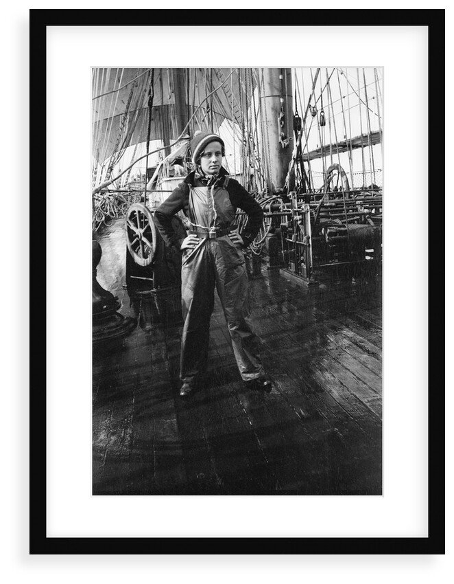 Elisabeth Jacobsen on deck, in oilskins, aboard 4 masted barque 'Parma' (Fi, 1902), ex 'Arrow' (Ruben de Cloux) by Alan Villiers