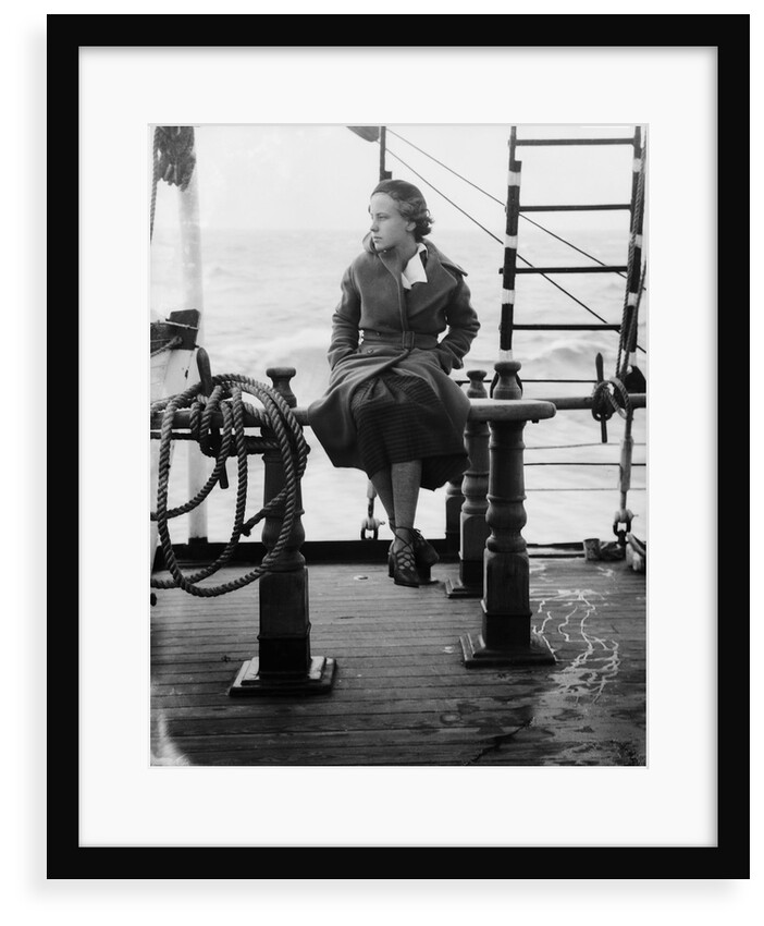 Elisabeth Jacobsenin shore clothes seated on the poop rail, aboard 4 masted barque 'Parma' (Fi, 1902), ex 'Arrow' (Ruben de Cloux) by Alan Villiers