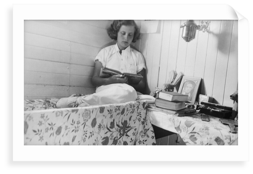 Elizabeth Jacobsen in her bunk by Alan Villiers
