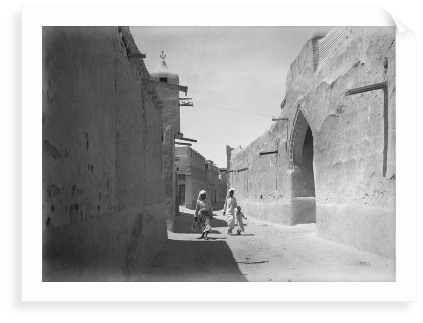 Kuwait street with an ornate doorwary details by Alan Villiers