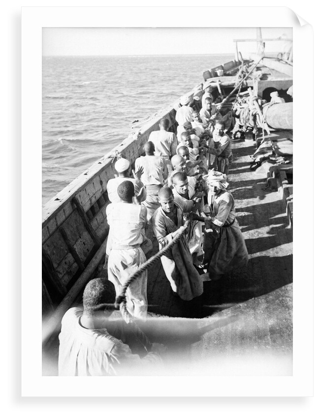 Hauling the 'Triumph of Righteousness' ashore by Alan Villiers
