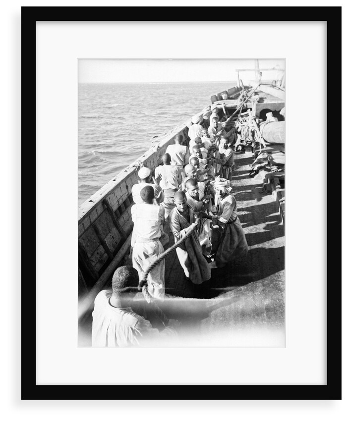 Hauling the 'Triumph of Righteousness' ashore by Alan Villiers