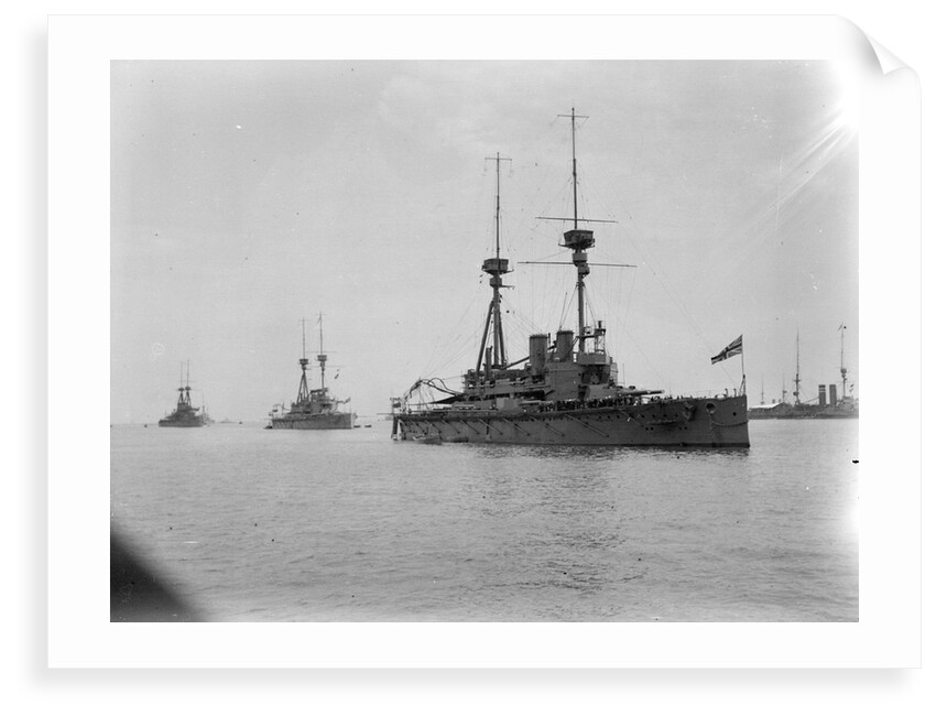 Battleship HMS 'Agamemnon' (1906) at anchor at Spithead, with awning rigged aft and 'Lord Nelson' astern of her by unknown
