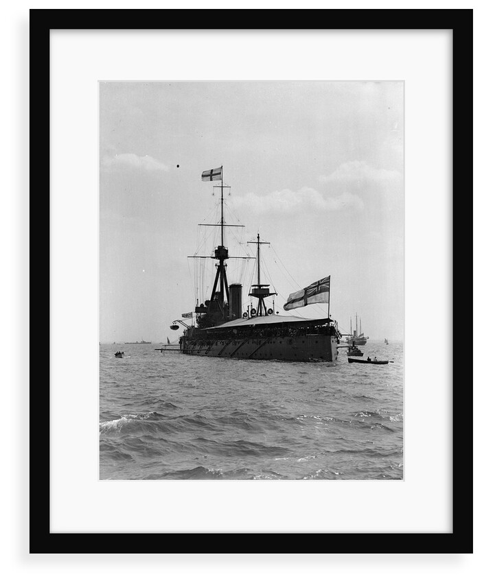 Battleship HMS 'Dreadnought' (1906) at anchor at Spithead, with awning rigged amidships and aft by unknown