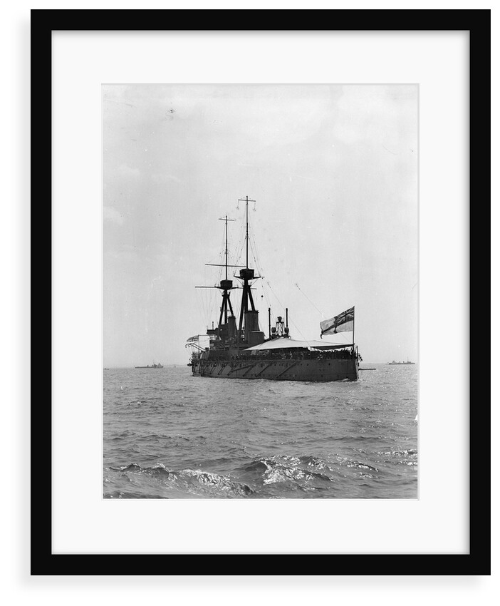 Battleship HMS 'Bellerophon' (1907) at anchor at Spithead, with awning rigged aft by unknown