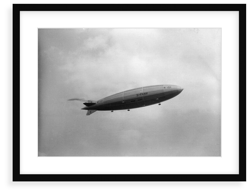 Photograph of rigid airship 'R101' (1929) in flight over Hendon by unknown