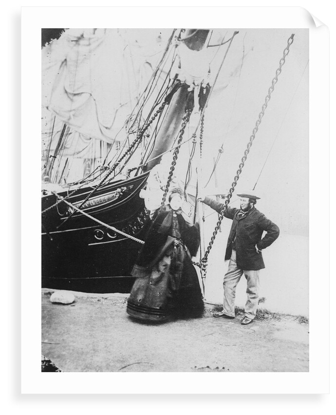Photograph of John and Ann Gambles standing by the bow of the 'Ann Gambles' barque by unknown