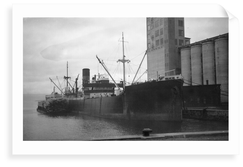 General cargo ship 'Sinnington Court' (Br, 1928) at quayside by unknown