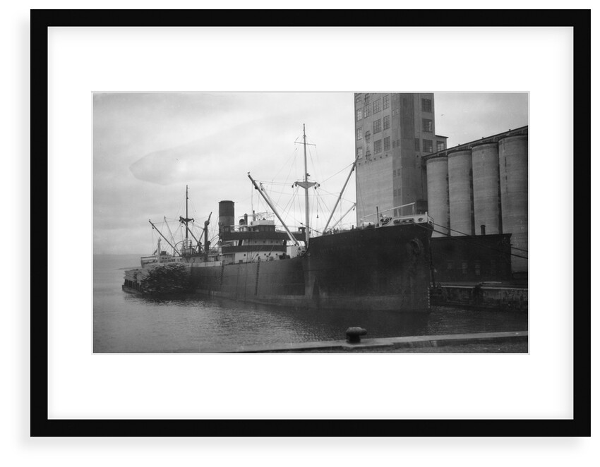 General cargo ship 'Sinnington Court' (Br, 1928) at quayside by unknown